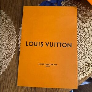 Louis Vuitton Bold Orange Bag with Blue Handles